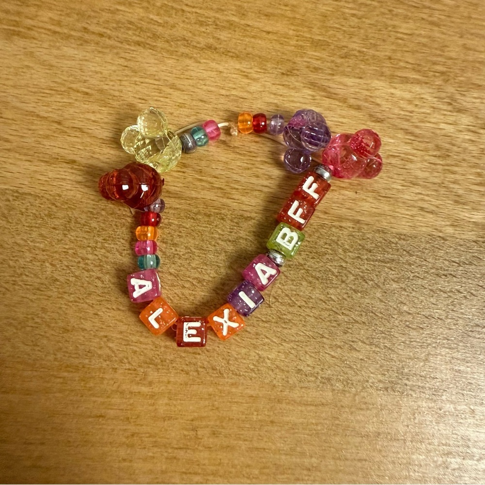 Alexia BFF pink glitter friendship bracelet with heart charms